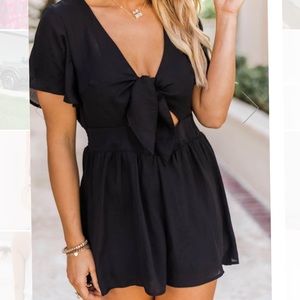 Pink Lily black dress romper.